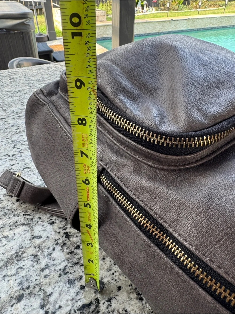 MMS Design Studio gray faux leather backpack
